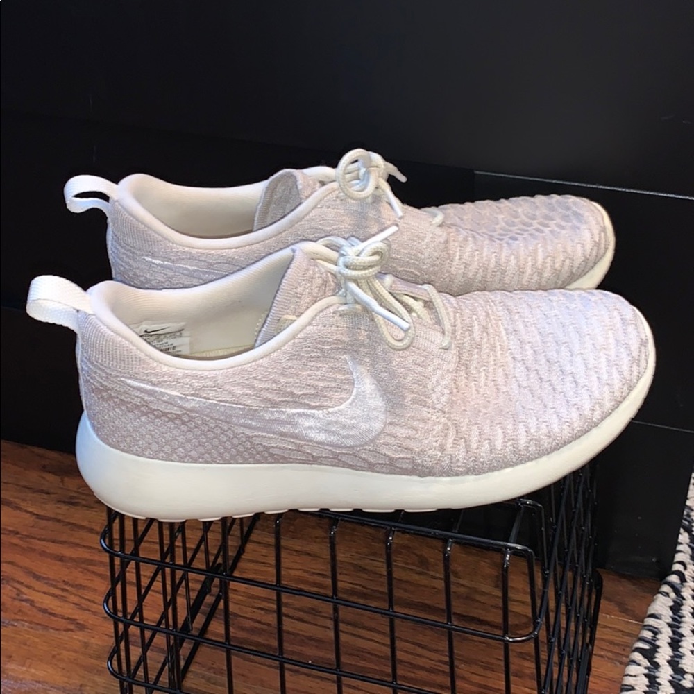 cream and white nike running shoes